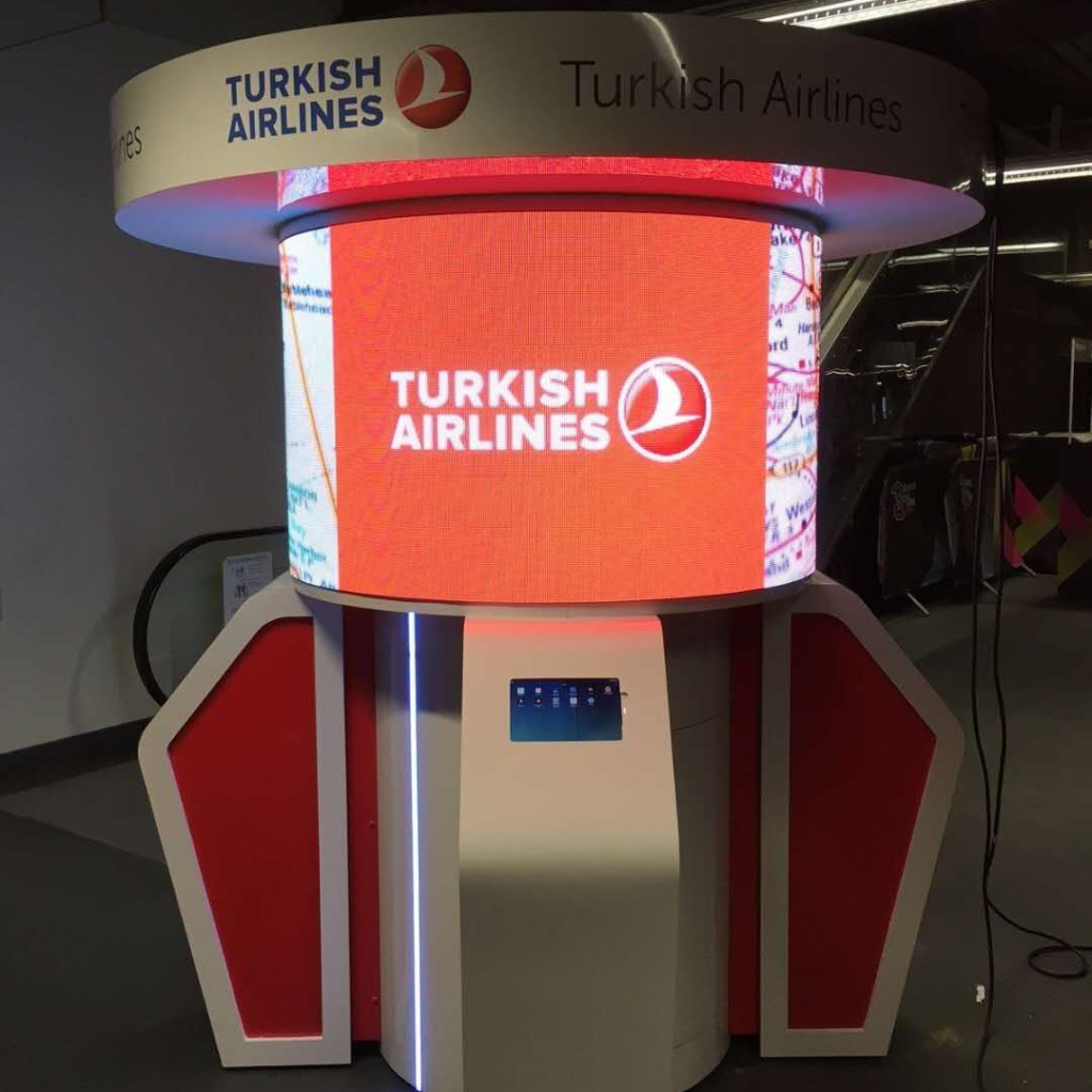 Cylindrical led displays constructed with led flexible modules are installed near stairways to provide traffic information alerts to pedestrians.